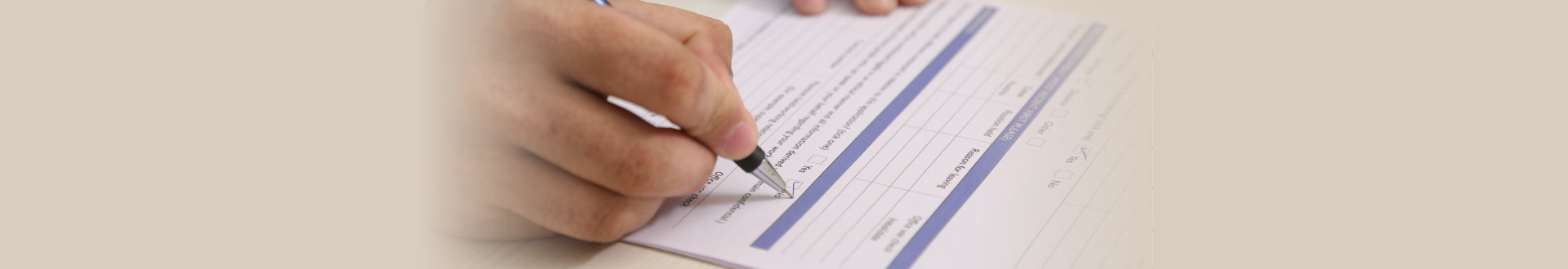 man filling out a form
